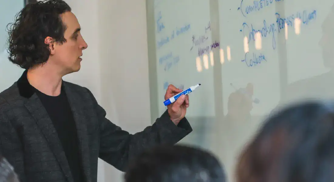SEO Expert Consultant Matthew Bertram Explains Strategies on a Whiteboard