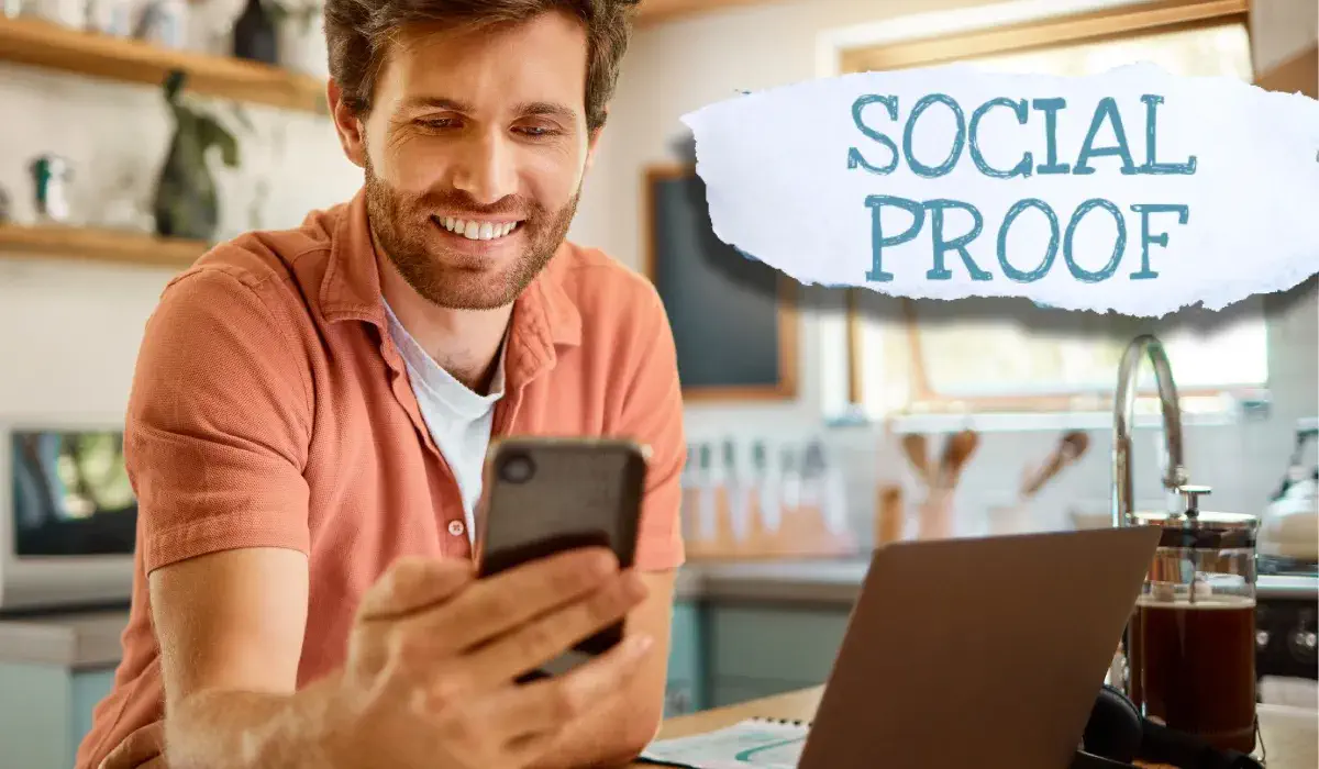 social proof demonstrated by a man checking social media for reviews